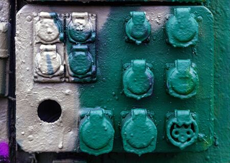 vandalized electrical equipment in abandoned industrial areaの写真素材