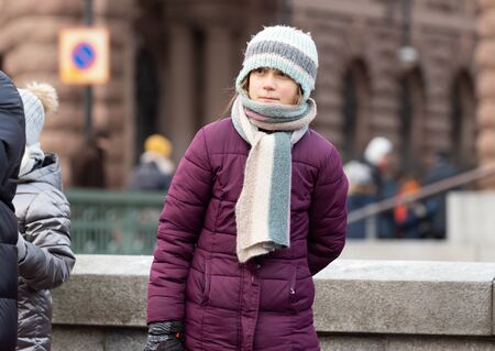 Stockholm, Sweden. 27 December, 2019. 16-year-old Swedish climate activist Greta Thunberg back in Sweden demonstrating on Mynttorget in Stockholm on Fridays.のeditorial素材