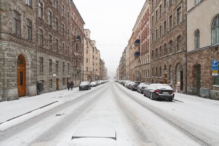 Quiet street on a cold snowy winter morningの写真素材