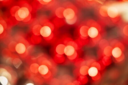 defocused bokeh pattern of Christmas lightsの写真素材