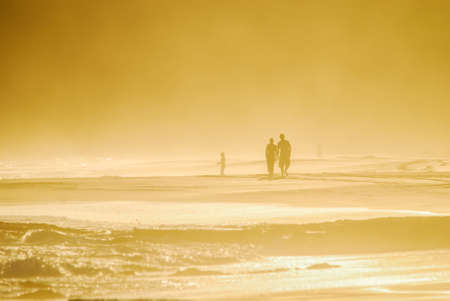 Couple walking on beachの写真素材