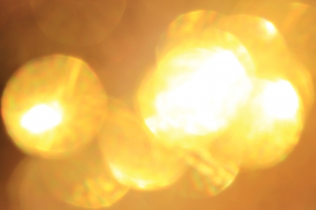 Color of Art - Abstract view of distorted Golden lightsの写真素材