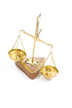 Scale of justice and two wedding ringsの写真素材