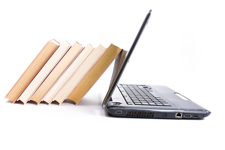 Books vs laptopの写真素材