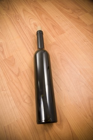 red wine galss on parquetの写真素材