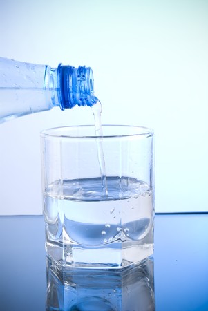 glass of water and bottle の写真素材
