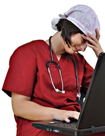 Attractive lady doctor with laptop isolated on white の写真素材