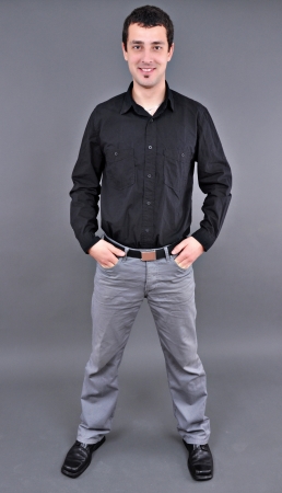 Full length portrait of a handsome young man standingの写真素材