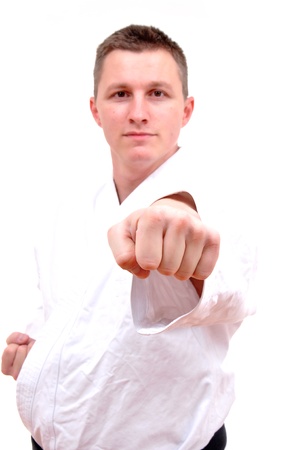 punch shock figure in the karate fighting stance on a white background hand-to-hand fighting の写真素材