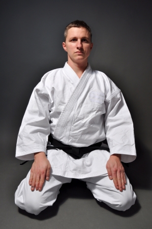 karate man on grey background studio shot の写真素材