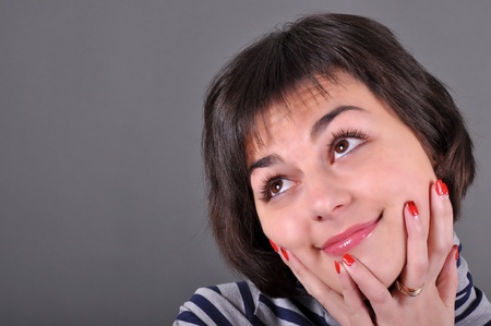 beautiful brunette woman looking upの写真素材