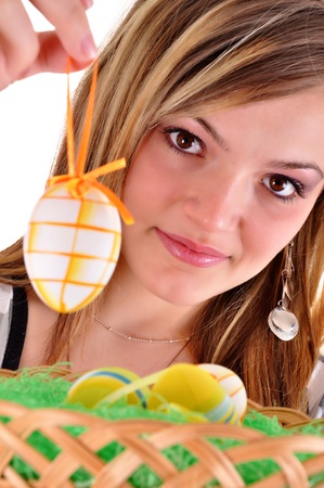 Young beautiful girl with easter egg in her hand の写真素材