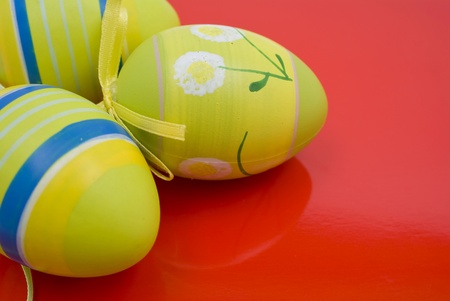 Easter eggs on red backgroundの写真素材