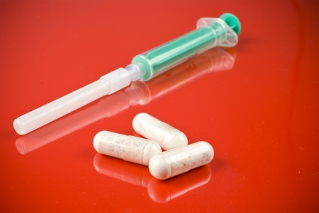 Syringe and pillsの写真素材