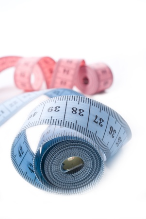 Measuring tape isolated on white background の写真素材