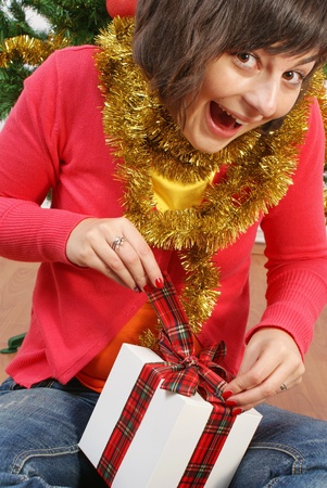 smiling girl with gift boxの写真素材