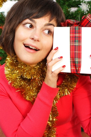 smiling girl with gift boxの写真素材
