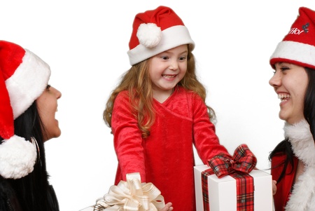 Christmas group portrait of three young  girls over white background の写真素材