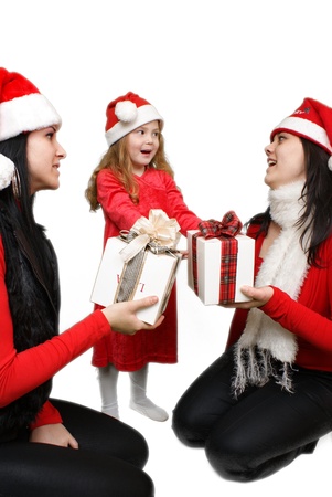 Christmas group portrait of three young  girls over white background の写真素材