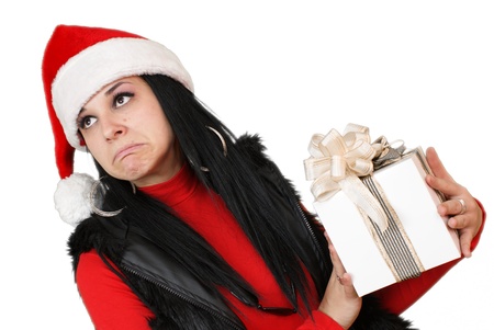 Girl holding a gift, isolated on white background  の写真素材