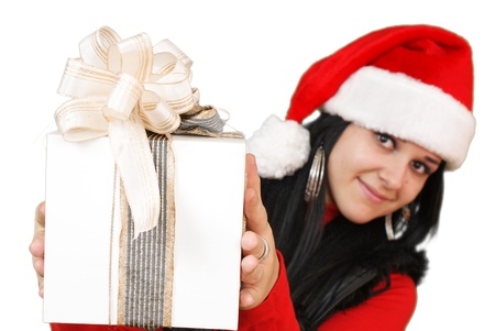 Girl holding a gift, isolated on white background  の写真素材