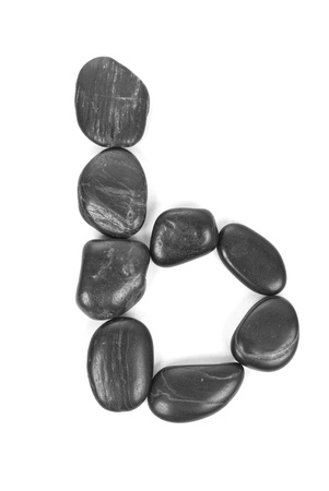 Small letter 'b' made of stones isolated on white の写真素材