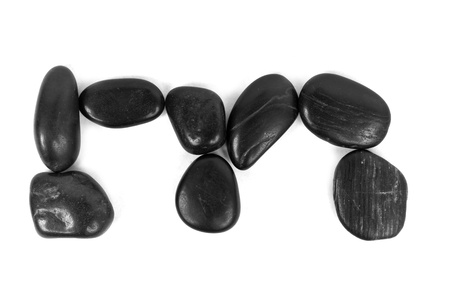 Small letter 'm' made of stones isolated on white の写真素材