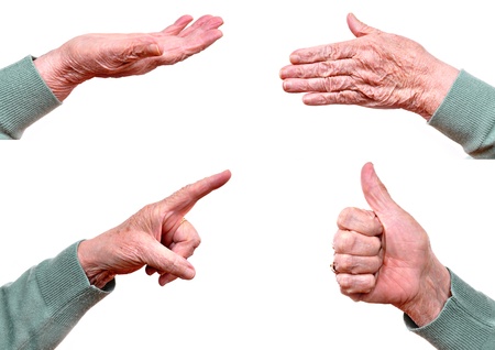 Senior woman's hand isolated on whiteの写真素材