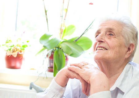 Happy old gray-haired woman の写真素材