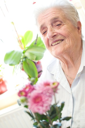 Happy old gray-haired womanの写真素材