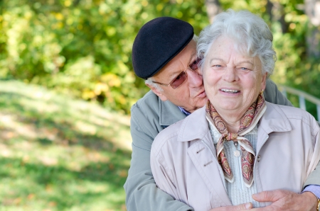 Beautiful senior couple in the parkの写真素材