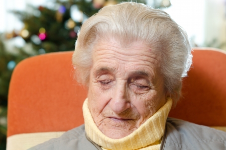 Old woman sleepingの写真素材