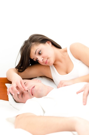 Snoring man. Couple in bed, man snoring and woman can not sleep,の写真素材