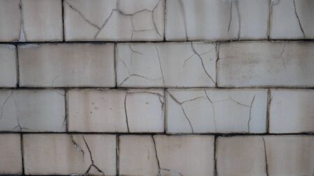 Texture of cracked white brick. Old buildingの写真素材