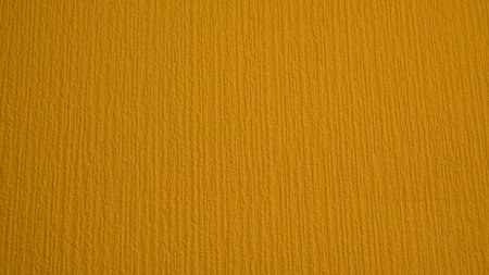 Yellow corrugated texture. Waves on a yellow background.の写真素材