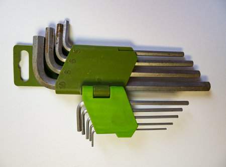 Hexagonal key on a white background. Copy space. Isolated hexagons. Construction tools. A place to...