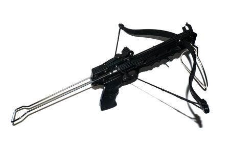 Sports crossbow on a white background. Shot from a crossbow. Isolated black little crossbow. View from above. There is room for text.の写真素材