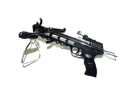Sports crossbow on a white background. Shot from a crossbow. Isolated black little crossbow. View from above. There is room for text.の写真素材