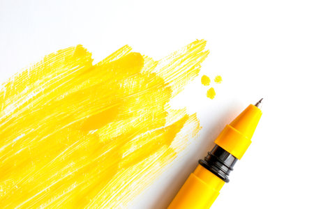Yellow Highlighter Pen and Doodles Isolated on White Background with Text Space.の素材