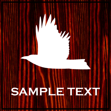 Hawk silhouette painted on wooden board with white paintのイラスト素材