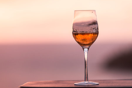 Drinking wine at sunset