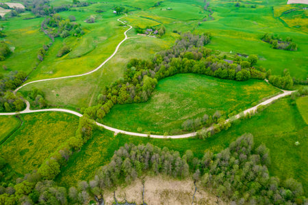 Rural landscape, view from the drone. Green fields in the north of Poland. SuwaÅ‚ki region in...