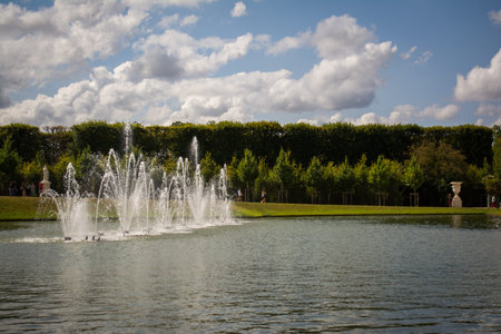 Fountains on Body of Water under Clouds in Versaillesのeditorial素材