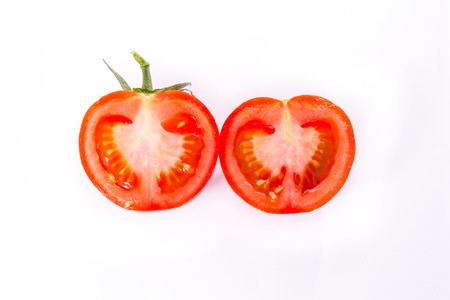 Tomato Slice Cut Cross Section Seed Cooking Fresh Vegetable Texture Isolated White Backgroundの写真素材