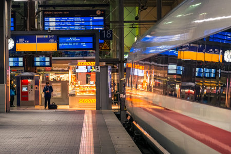 Deutsche Bahn ICE Bullet Train Closeup Side Train Station Parked Winter 2017 in Munich, Germany Hauptbahnhofのeditorial素材