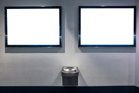 Double Advertisement Billboard Mockups over Water Fountain Public Wallの写真素材