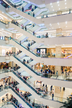 Escalator in a Chinese Multi-floor Market with People on them  in Xi'an, China, March 2018のeditorial素材