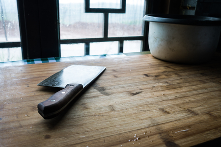 Kitchen Knife on Cutting Board in Chinaの写真素材