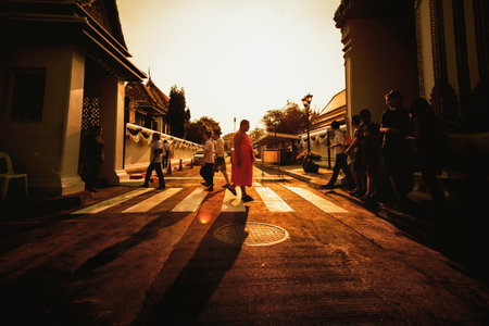 Bangkok, Thailand - February 2 ,2019: Monk Walking Alone at Sunset Crosswalk City Thailand Asian Urban Scene Religious Disciple in Crowdのeditorial素材