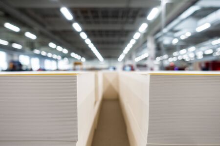 Stack of Paper Closeup Depth of Field Industrial Printing Production Material Detail Beigeの写真素材